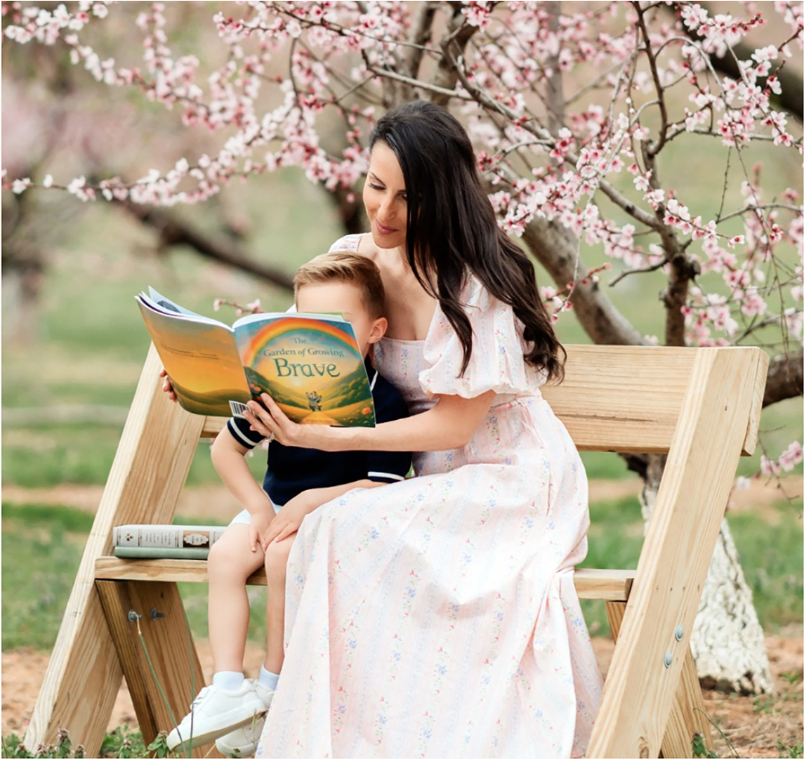Mother reading The Garden of Growing Brave with her child, during recovery from medical trauma and supporting healing, safety, and co-regulation.