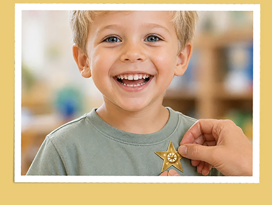 Child receiving a bravery badge sticker, reinforcing courage and building positive medical associations after a healthcare visit.